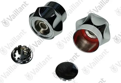 Zwei glänzende Vaillant Drehknöpfe in rot und blau mit einem separaten Deckel. Beide Teile sind zylindrisch und haben ein gewindeartiges Innenteil.